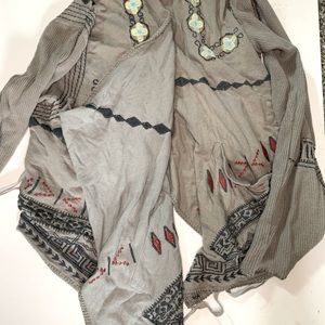 Gorgeous waterfall wrap, by Johnny Was.